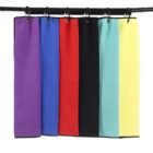 Waffle golf towel for cleaning clubs and balls, quick-dry and durable design for golf bags.